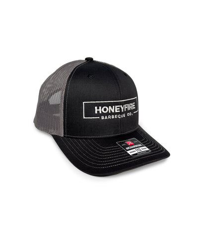 Embrace timeless style with our HoneyFire Richardson 112FP Trucker Cap